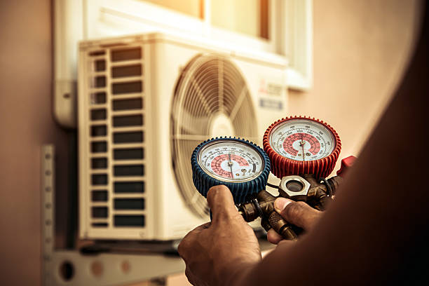 Professional Heat Pump Repair technician working in Owensburg, IN